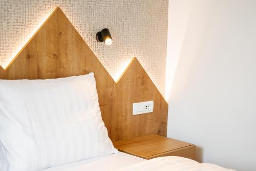 Family apartments Soča Splash Homeにあるベッド