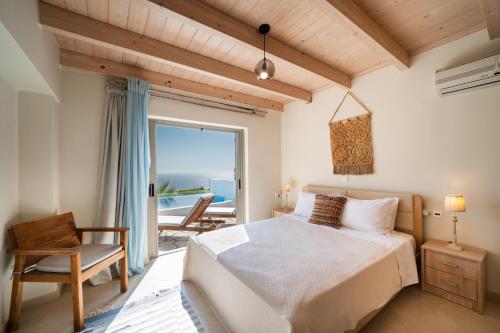 Ένα ή περισσότερα κρεβάτια σε δωμάτιο στο White Villas Lefkada