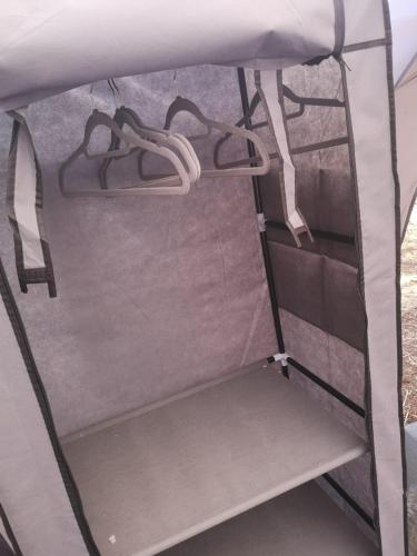 an interior view of a bed in a camper van at Nuraghe Ruiu Villaggio Tende Attrezzate in Norbello