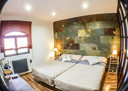 Posteľ alebo postele v izbe v ubytovaní Green Peaks B&B Country House Alojamiento Rural