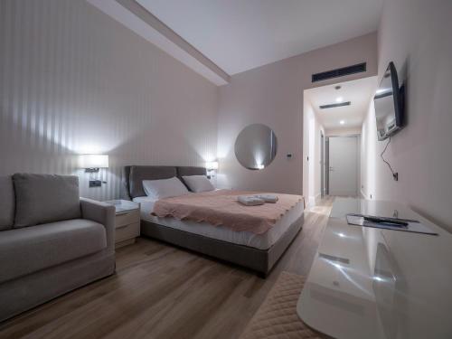 Postel nebo postele na pokoji v ubytování CASA AL MARE RESIDENCE