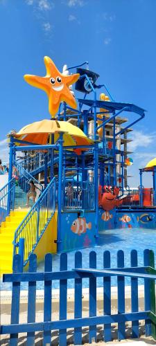 a water park with a slide on the beach at Baku, Seabreeze, Park Residence 2 in Baku