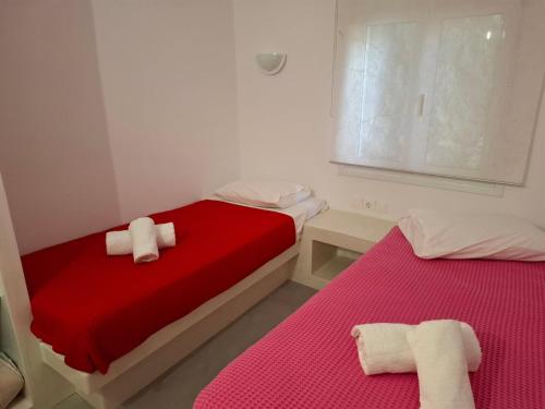 Ένα ή περισσότερα κρεβάτια σε δωμάτιο στο Villa Foivos