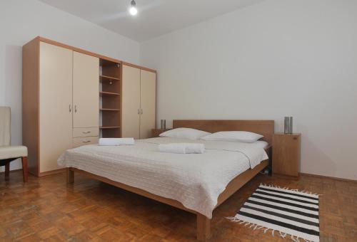 Postel nebo postele na pokoji v ubytování Murter - SeaView & Magic Sunsets