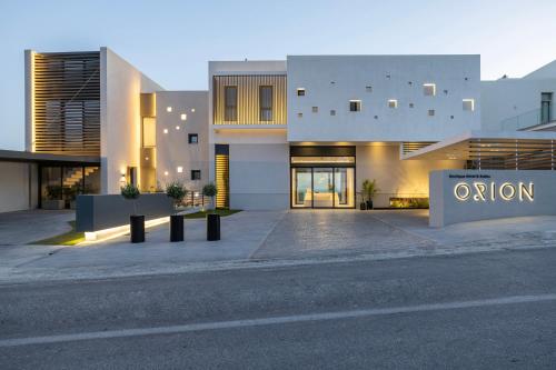 an empty street in front of a building at Orion Tinos Suites in Vrachonisída Chántra