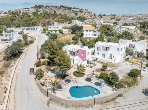 an aerial view of a house with a pool at CrossRhodes Villas in Pefki Rhodes