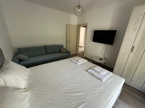 Postel nebo postele na pokoji v ubytování Apartmani Aki 4