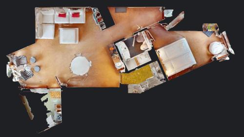 an overhead view of a room with a table at Abitaziun Quadratscha 20 - Samedan in Samedan