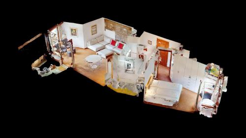 an overhead view of a house with a room at Abitaziun Quadratscha 20 - Samedan in Samedan