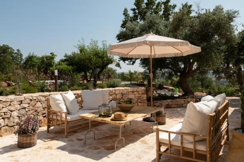 Posezení v ubytování Trullo Nascosto, Puglias Hidden Gem