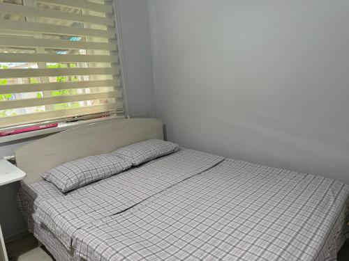 Ein Bett oder Betten in einem Zimmer der Unterkunft Nomads Home