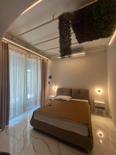 Ένα ή περισσότερα κρεβάτια σε δωμάτιο στο B&b Cityfair