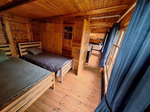 Postel nebo postele na pokoji v ubytování Guest House 'Selgas', Engure