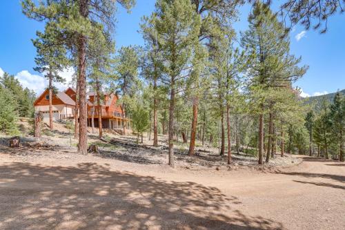 a house in the middle of a forest at 8 Mi to Staunton State Park Mtn-View Hideaway! in Conifer