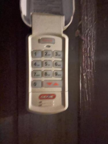 a close up of a remote control in a box at Convenient & Cozy Stay Near Boston in Andover