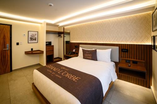 Cama o camas de una habitación en Hotel Grand L'Orbe by JAMM