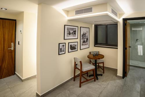 Zona de estar de Hotel Grand L'Orbe by JAMM