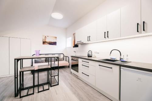 Una cocina o cocineta en Silvie Apartments - Wurmova