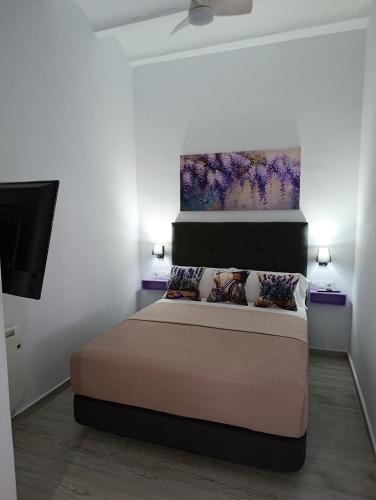 Ένα ή περισσότερα κρεβάτια σε δωμάτιο στο Casa Sahar