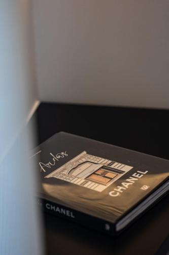 a book sitting on top of a table at Madonna del Mare City in Chania Town