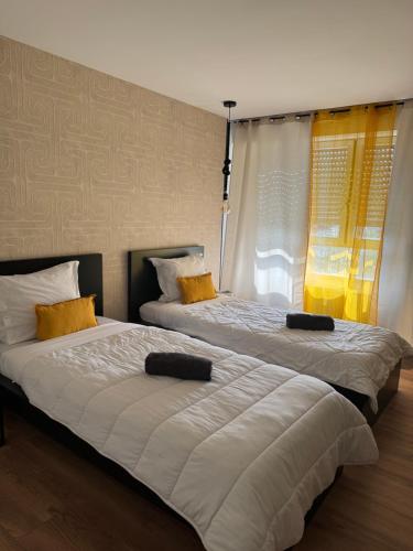 Llit o llits en una habitació de Luxe home