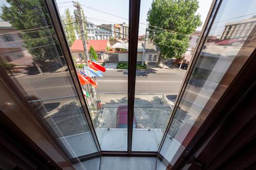 a view from a window of a street at Centrum Hotel Tashkent in Tashkent