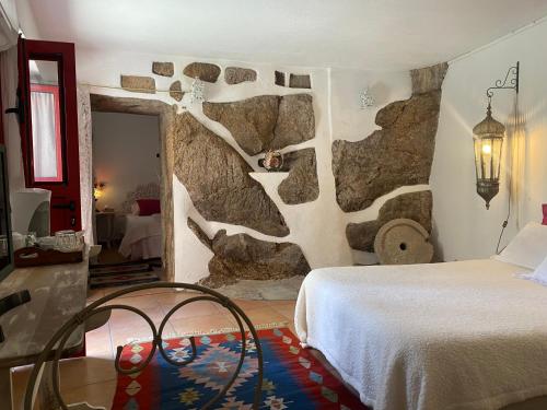 Ένα ή περισσότερα κρεβάτια σε δωμάτιο στο Casa de David