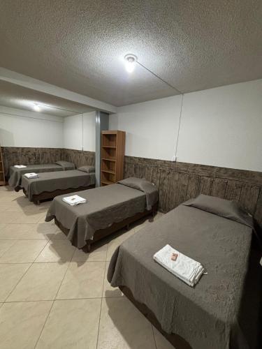 Postel nebo postele na pokoji v ubytování Oberon Business Hotel