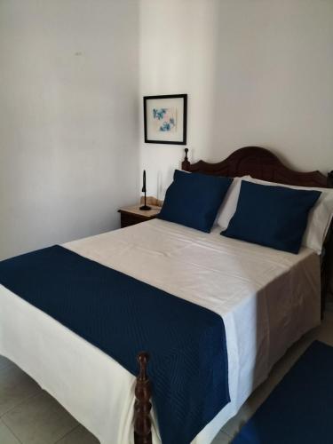 Postel nebo postele na pokoji v ubytování Casa dos Avós