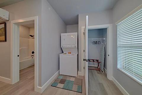 a kitchen with a washer and dryer in a room at #6 Studio Town Place 2 in Sevierville