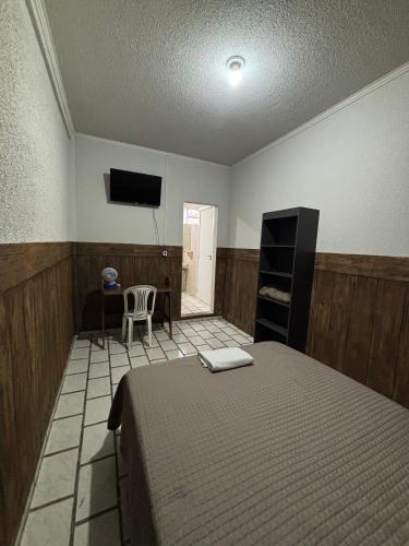 TV a/nebo společenská místnost v ubytování Oberon Business Hotel