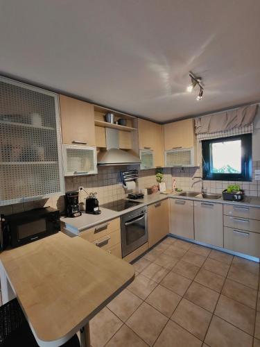 Η κουζίνα ή μικρή κουζίνα στο La Suite Apartment
