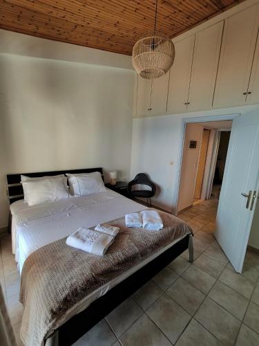 Ένα ή περισσότερα κρεβάτια σε δωμάτιο στο La Suite Apartment