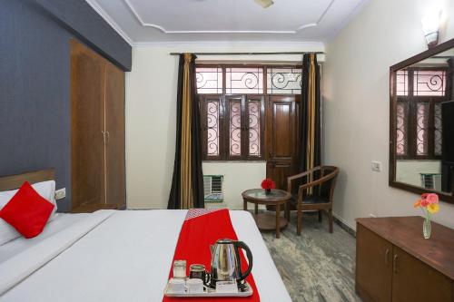 Giường trong phòng chung tại Hotel O AV Homes