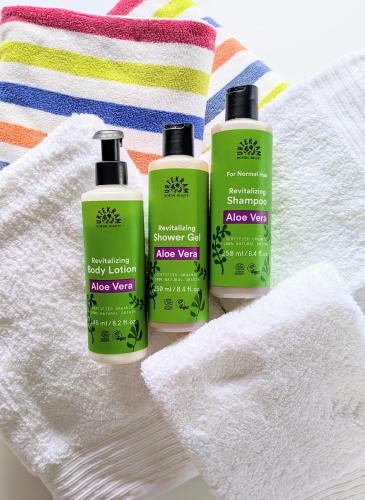 three bottles of algae wash sitting on a towel at 5-star homestay for 2 with breakfast, hot-tub, aircon and bikes in Ingarö