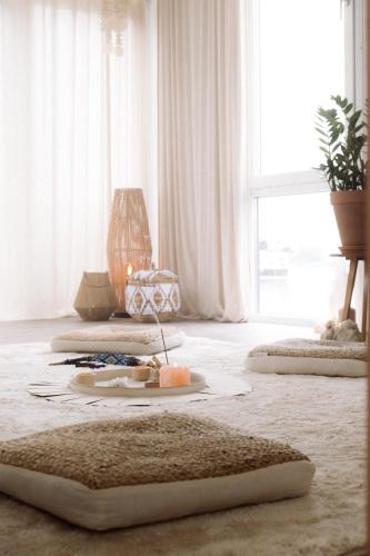 a living room with white curtains and a large window at RetreatBoat Ibiza in Lith