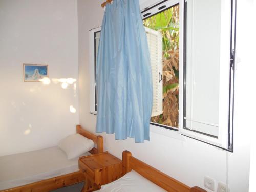 Postel nebo postele na pokoji v ubytování Helonata Apartments
