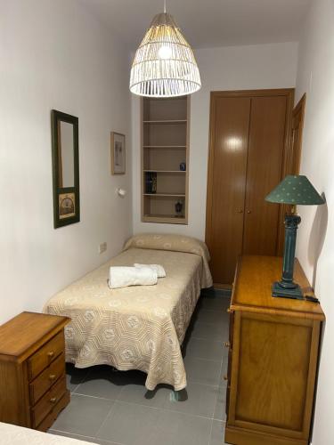 Katil atau katil-katil dalam bilik di Apartamento en Canet den Berenguer