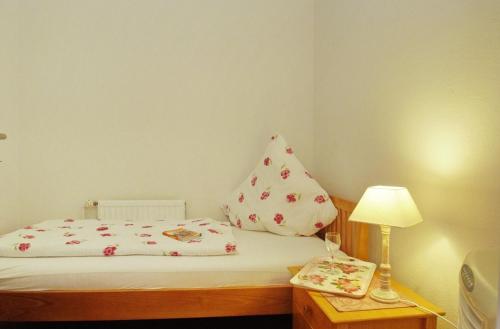 Ein Bett oder Betten in einem Zimmer der Unterkunft City Apartment Papenburg