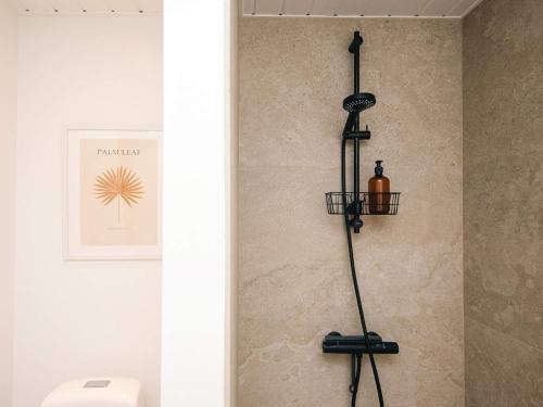 a bathroom with a shower with a toilet in a room at 6 person holiday home in Haderslev in Haderslev