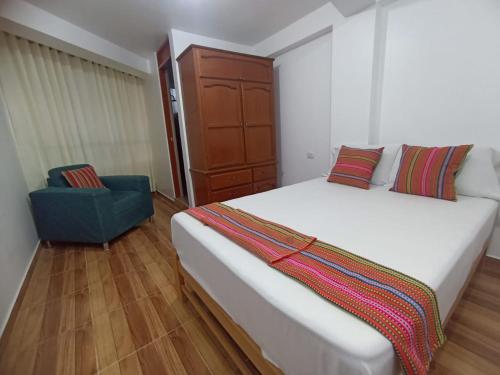 Postel nebo postele na pokoji v ubytování Habitaciones Cusco