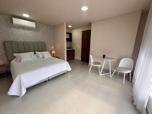Cama o camas de una habitación en Lofts Medellin-Laureles