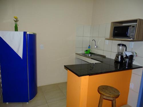 Dapur atau dapur kecil di Apartamentos da Coló