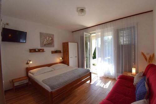 Apartments with parking space Banjol, Rab - 24672