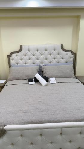 Cama o camas de una habitación en Luxe Oasis
