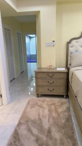 Cama o camas de una habitación en Luxe Oasis