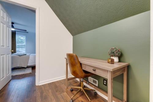 a home office with a desk and a chair at The Mountain Muse - Music, Games, HotTub, Sleeps12, PetsOk in McGaheysville