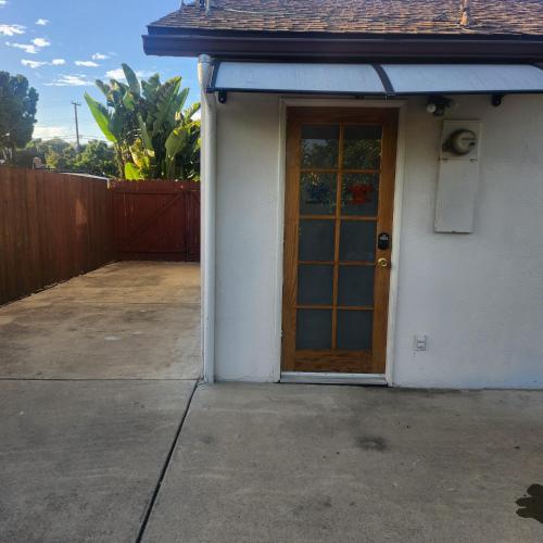 a front door of a house with a driveway at Cozy & Private Room in Goleta in Santa Barbara