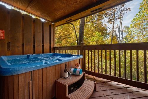 Kate's Cabin - 3 min to Dollywood! Cabin with Hot tub, Game Room, and Resort Pool! photo 3