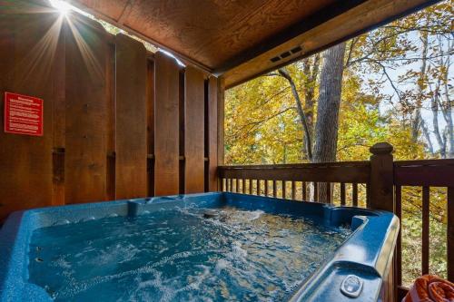 Kate's Cabin - 3 min to Dollywood! Cabin with Hot tub, Game Room, and Resort Pool! photo 21